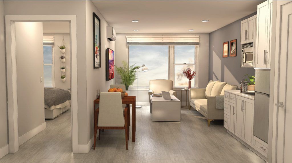A modern living room with sleek furniture and ample natural light.