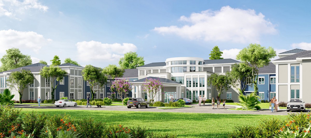 A modern luxury residential building surrounded by lush greenery and a clear blue sky.