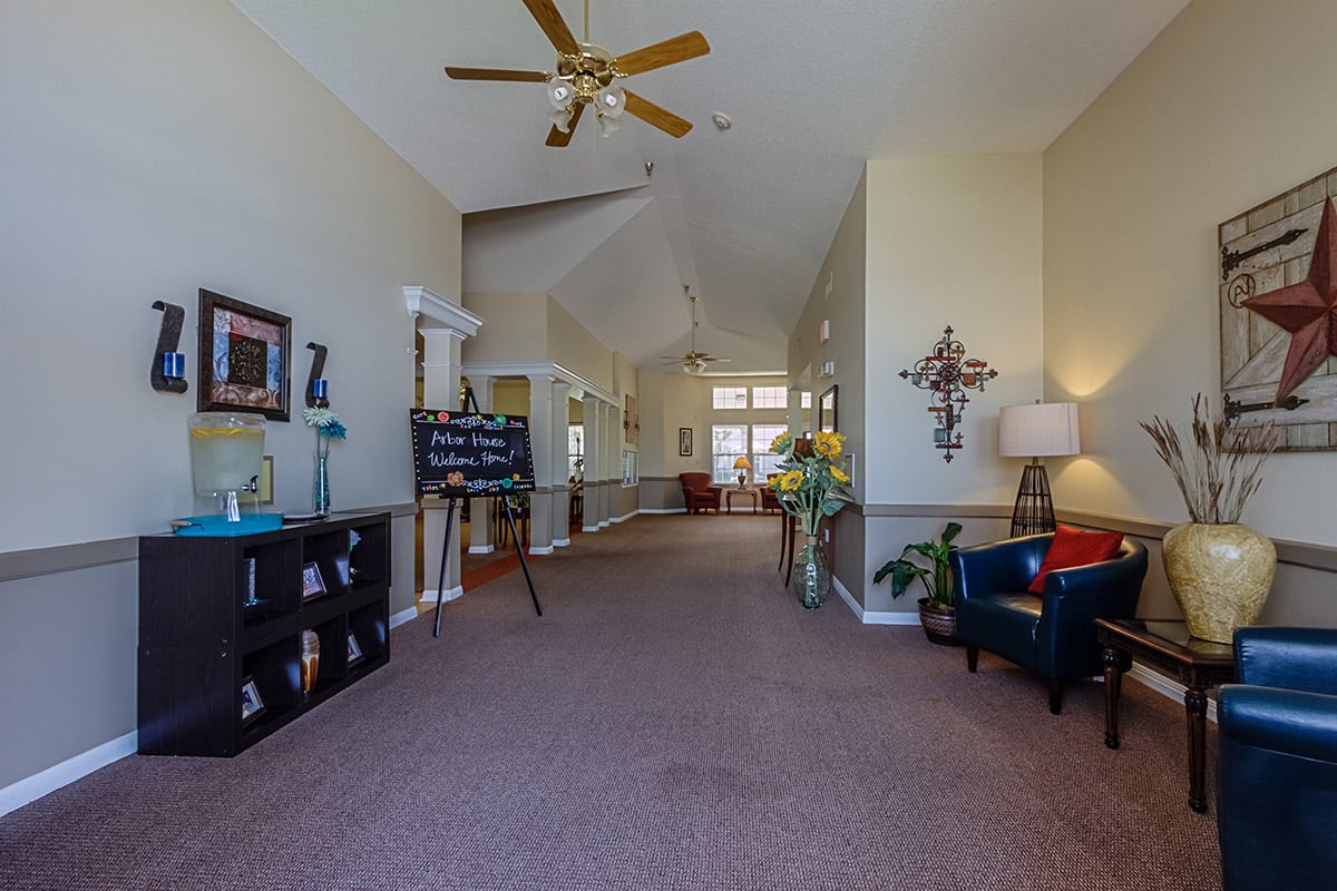 A spacious lobby area with comfortable seating and decorative elements.