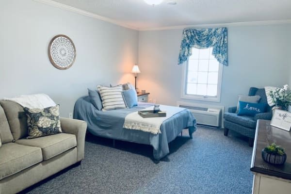 A cozy living room with comfortable seating and a soft color palette.