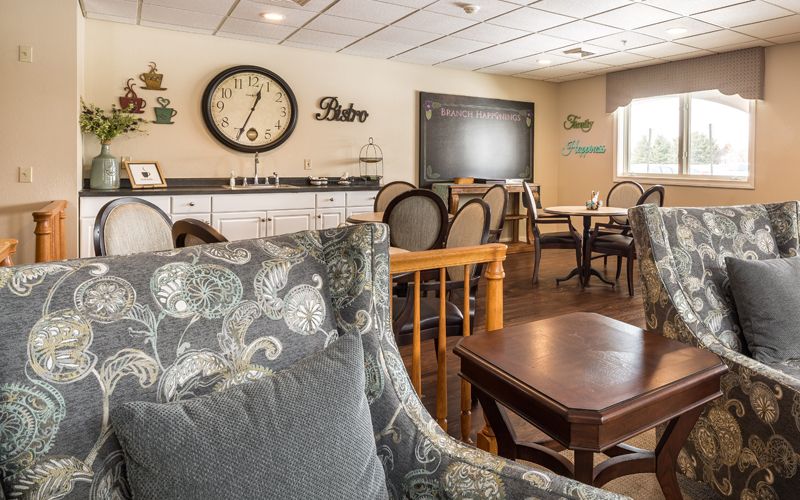 A cozy lounge area with comfortable seating and elegant decor.