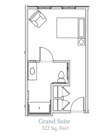 This is a floor plan of a grand suite, featuring a bedroom, bathroom, and seating area.