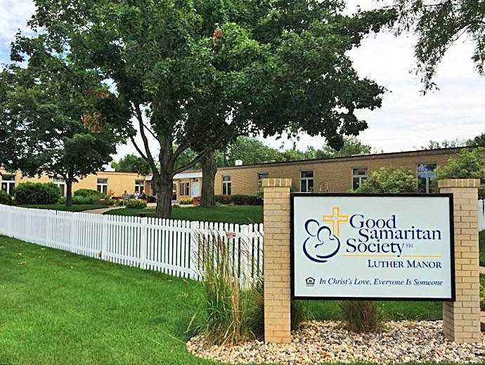 Exterior view of the Good Samaritan Society with a sign and well-maintained lawn.