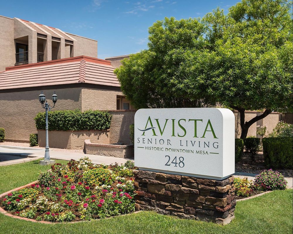 Avista Senior Living building with a sign and landscaped surroundings.