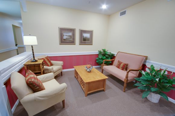 A cozy living room with comfortable seating and warm decor.