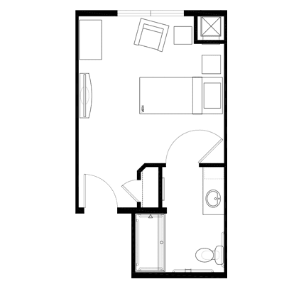 A floor plan of a small apartment with designated areas for a bed, seating, and bathroom.
