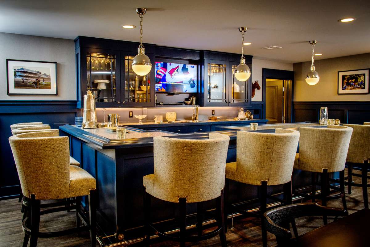 Modern bar interior with comfortable seating and ambient lighting.