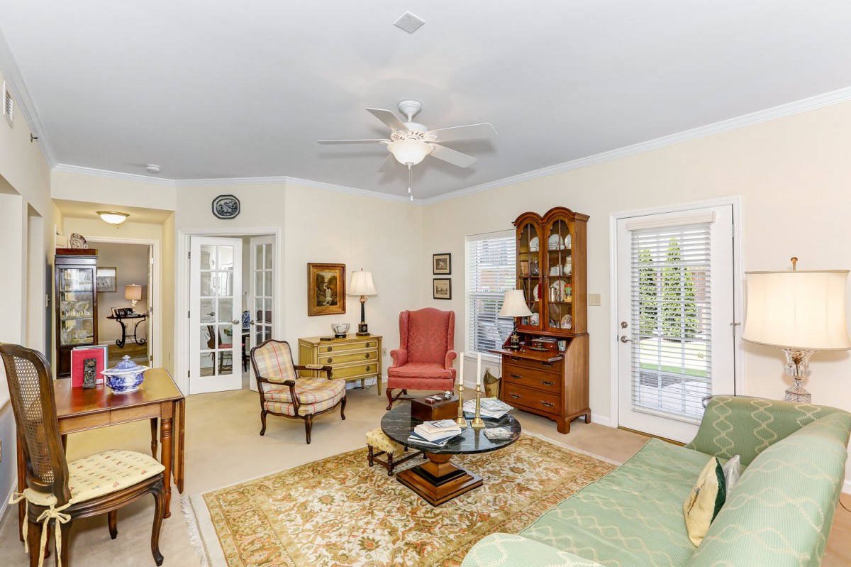 A traditional living room with elegant furniture and classic decor.