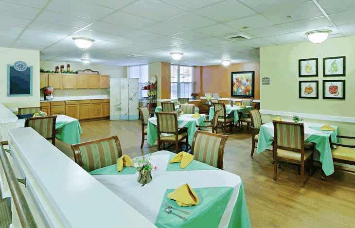 A well-arranged dining room with tables set for a meal.