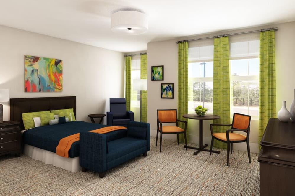 A modern bedroom with colorful decor and natural light.