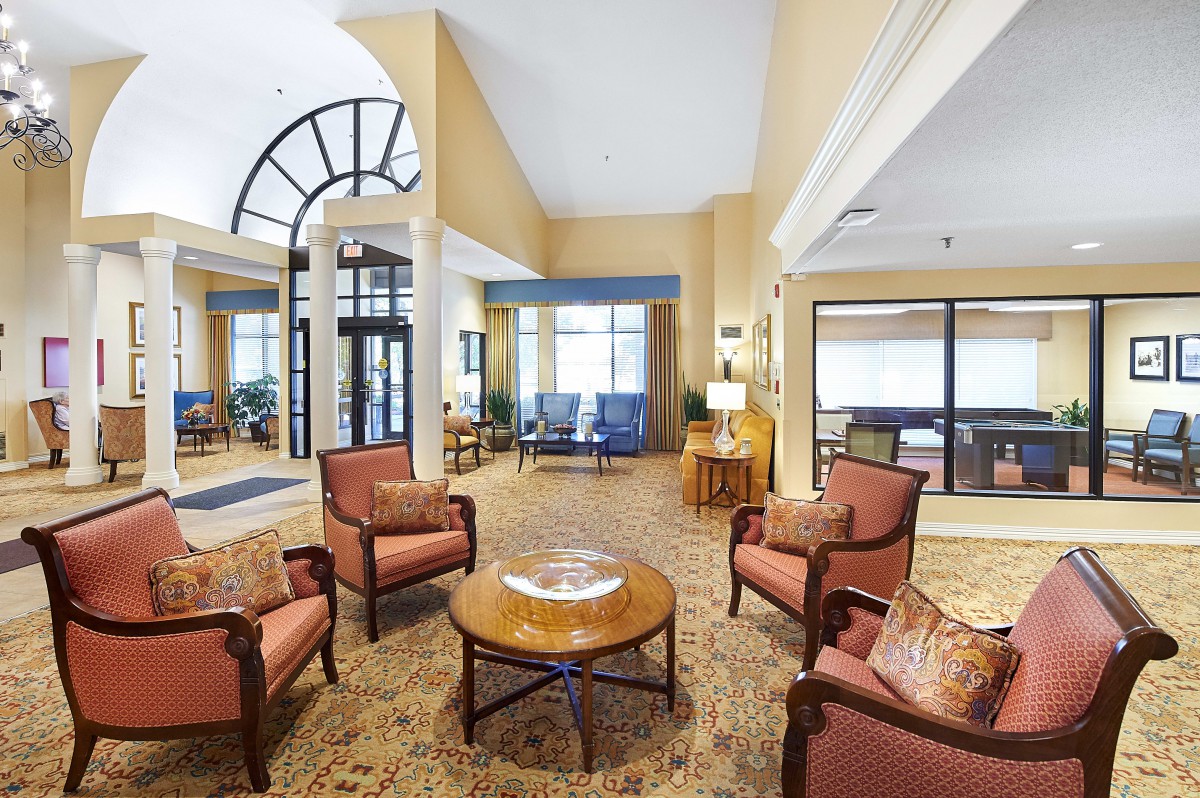 A spacious lobby area with comfortable seating and elegant decor.