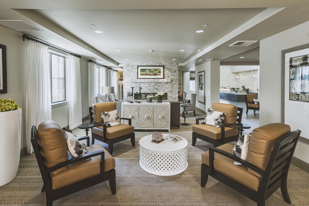 A modern living room with comfortable seating and stylish decor.