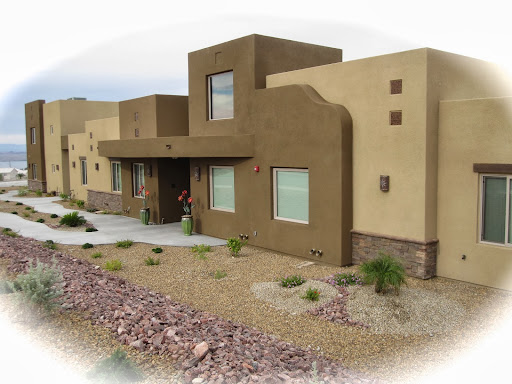 A modern desert home featuring adobe-style architecture.