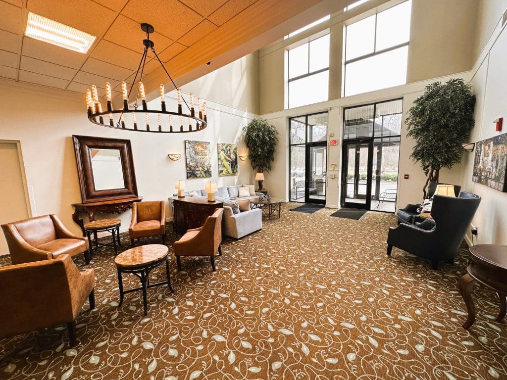 A spacious lobby with elegant decor and comfortable seating.