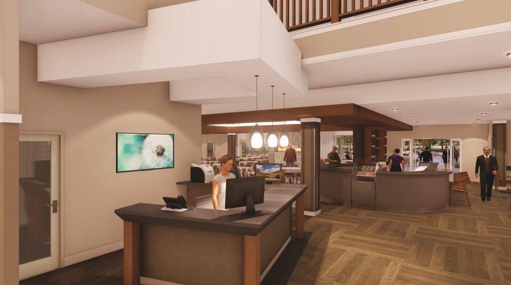 Modern lobby reception area with elegant interior design and lighting.