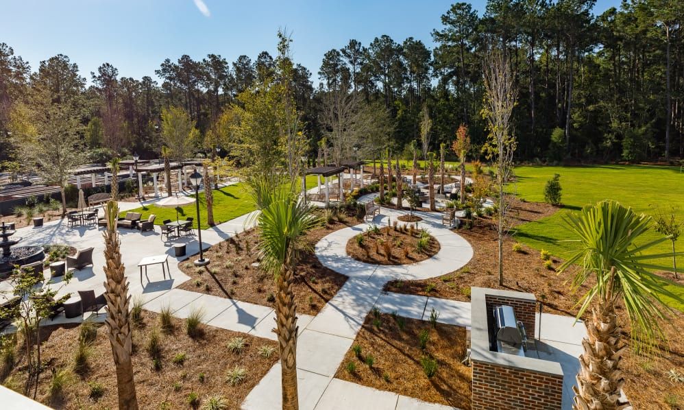 A scenic park with winding pathways and lush greenery.