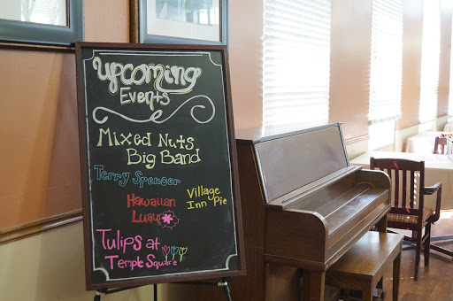 A chalkboard displaying upcoming events, featuring the Mixed Nuts Big Band.