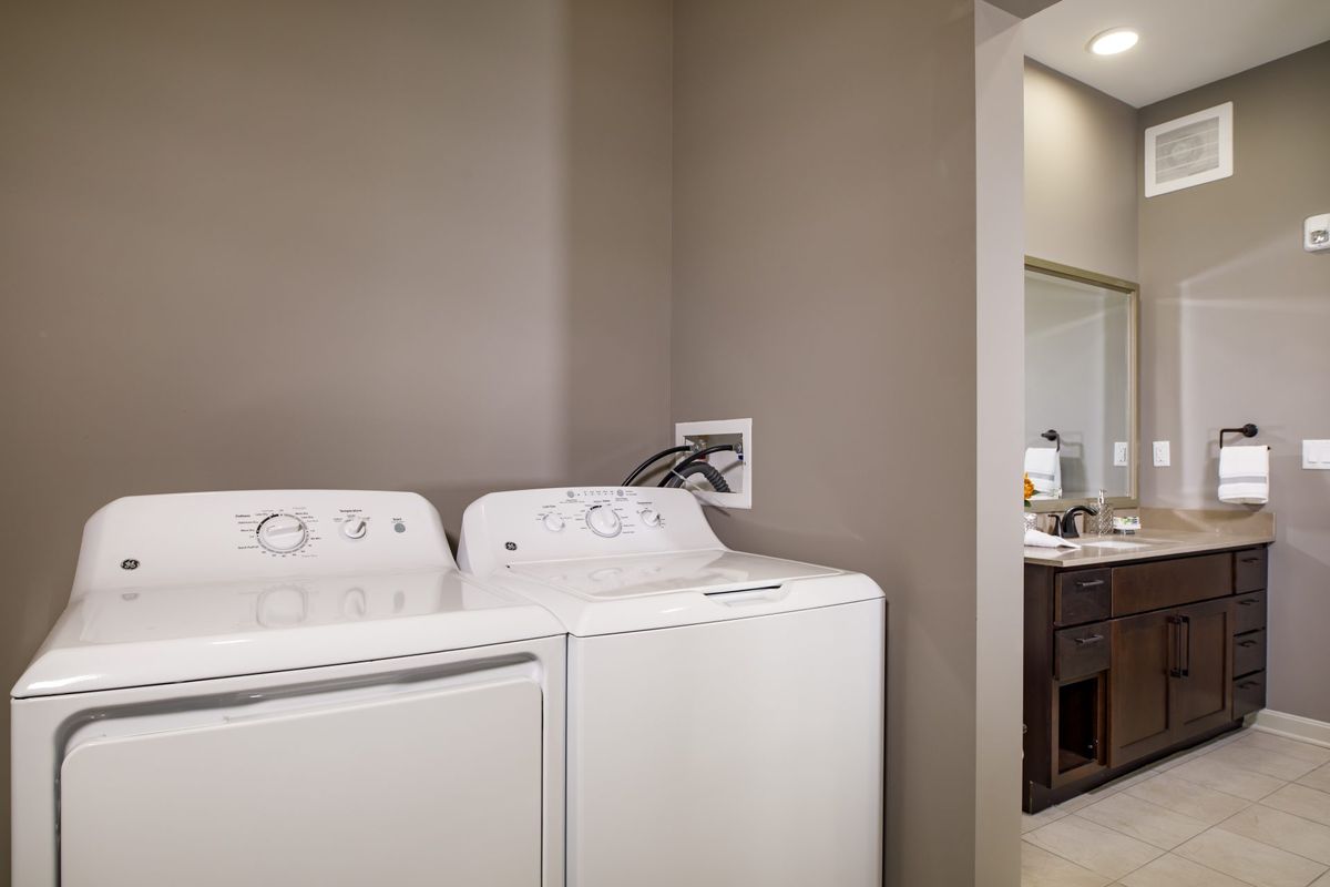 A laundry room with a washing machine and dryer.