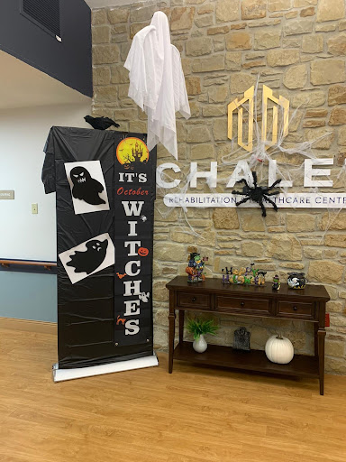 Spooky Halloween decorations featuring a playful witch theme.