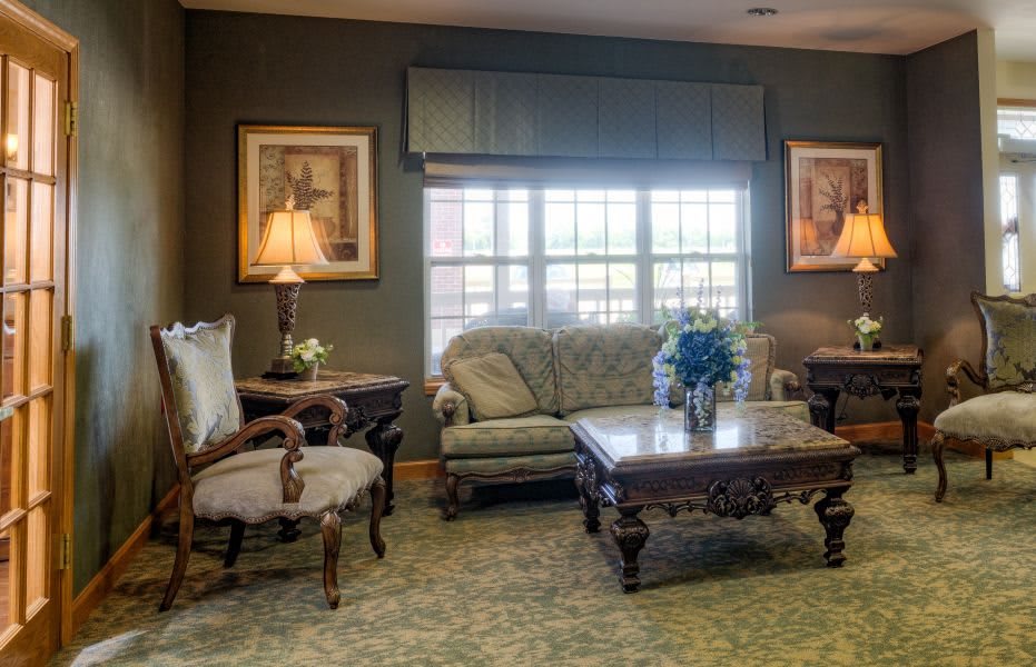 A cozy living room with elegant furniture and soft lighting.