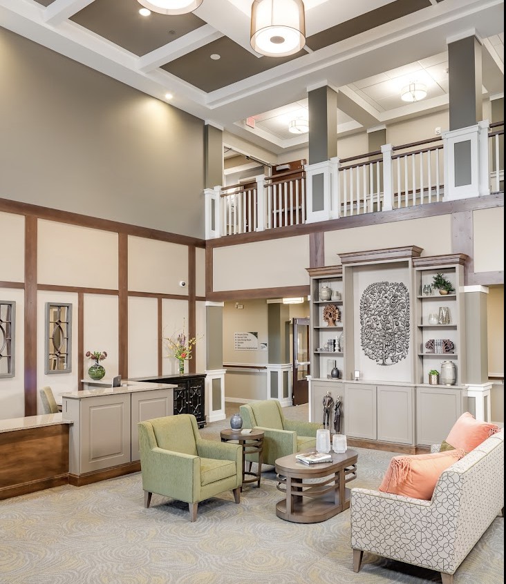 A spacious and modern lobby with comfortable seating and elegant decor.