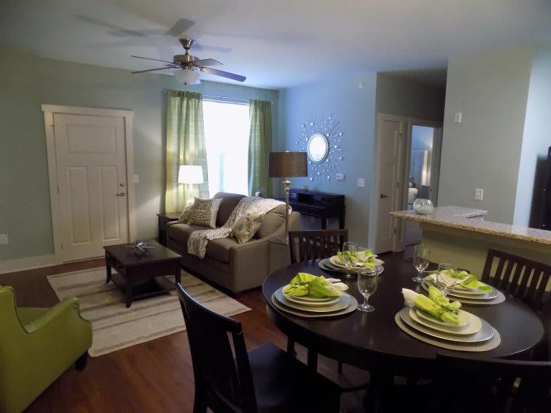 Cozy living and dining area with elegant table setting.