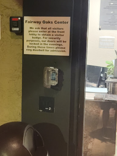 Notice at the entrance of Fairway Oaks Center regarding privacy and business operations.