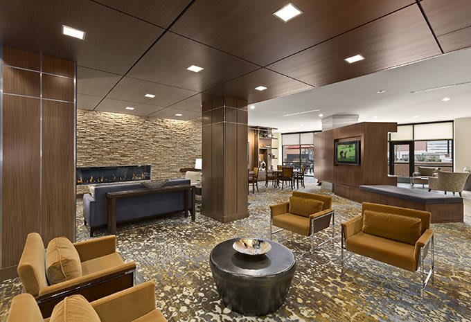 A modern lobby interior with comfortable seating and stylish decor.