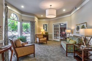 A cozy living room with comfortable seating and soft lighting.