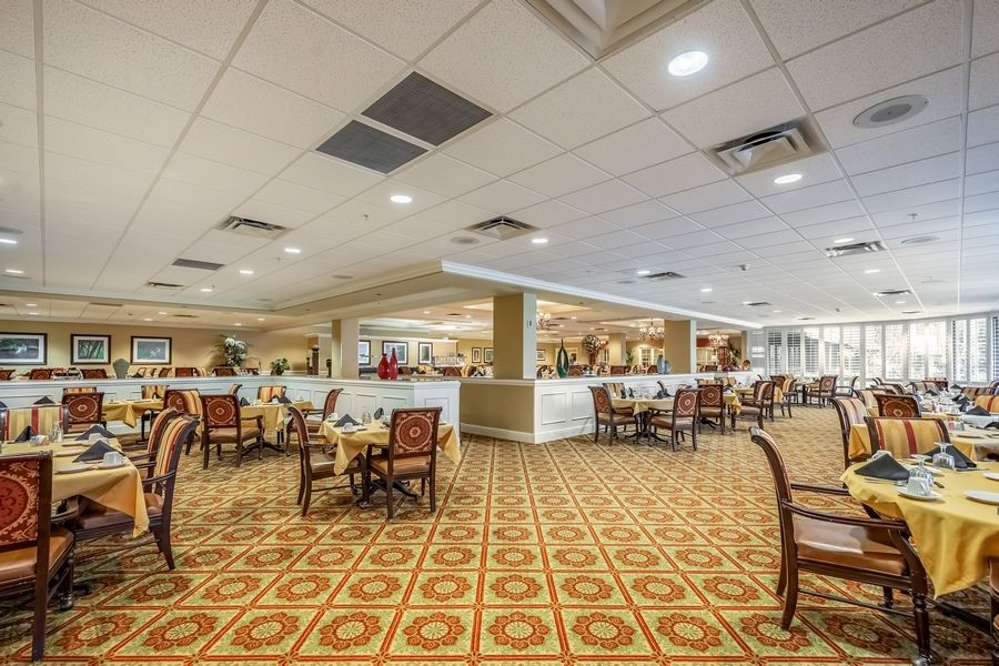Spacious restaurant dining area with elegant decor and ample seating.