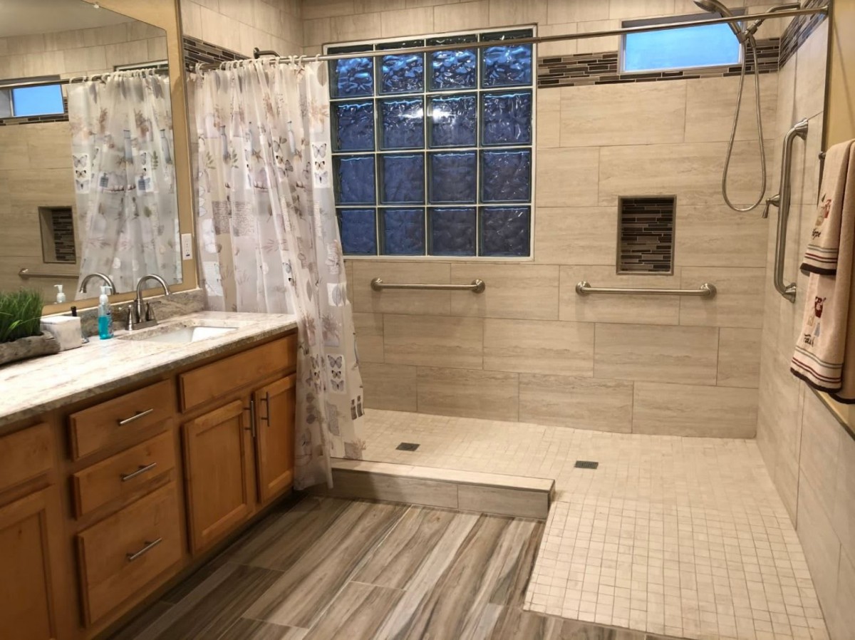 Spacious bathroom with a walk-in shower and double sink vanity.