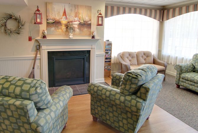 Cozy living room with a fireplace and comfortable seating.