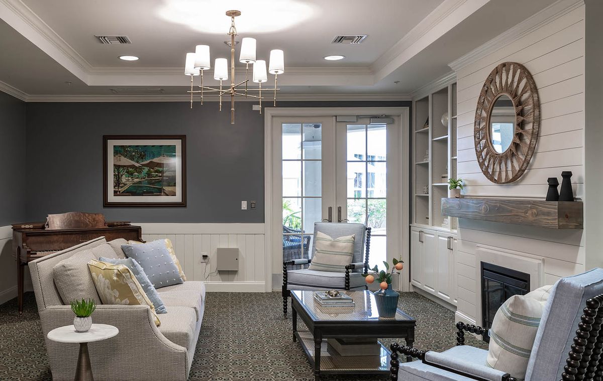 A modern living room with elegant furnishings and decor.