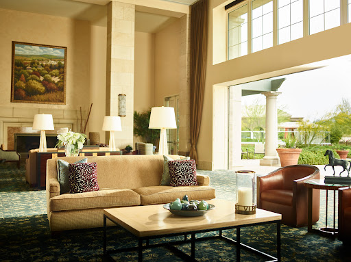 A stylish and inviting living room with comfortable seating and ample natural light.