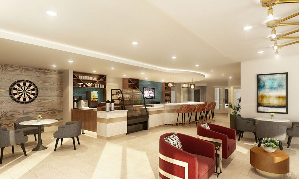 A modern cafe interior with a bar and seating area.