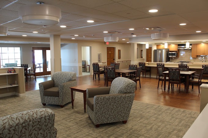 A modern lounge area with comfortable seating and a communal space.