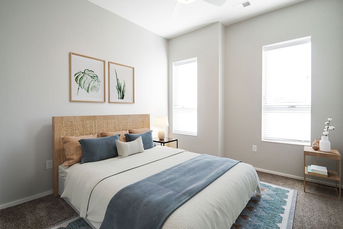 A modern, minimalist bedroom with natural light and stylish decor.