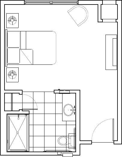 A simple floor plan featuring a bedroom, bathroom, and living area.