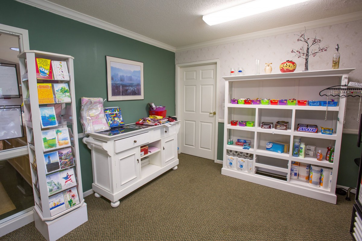 A children's waiting area with toys and books on display.