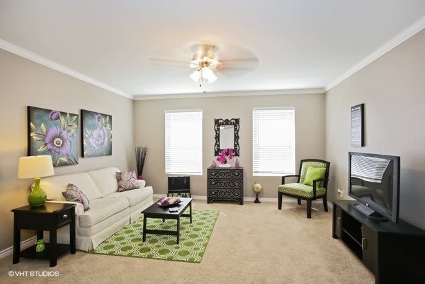 A modern living room with stylish furniture and decor.