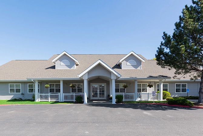 A large residential house with a welcoming entrance and porch.