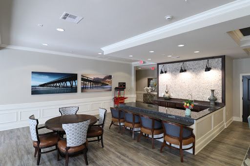 A modern lobby and dining area featuring stylish furniture and a welcoming atmosphere.