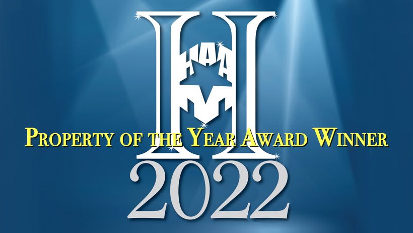 Logo for the 2022 HM Award with text indicating 'City of the Year Award Winner'.