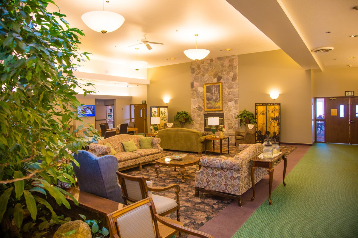A cozy lobby area with comfortable seating and warm lighting.