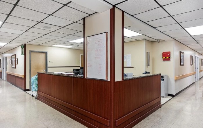 A clean and professional reception desk in an office setting.