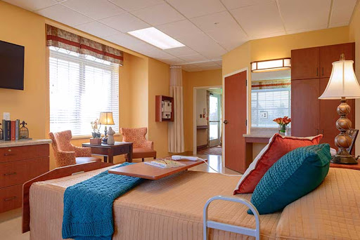 A welcoming and comfortable hospital room designed for patient care.