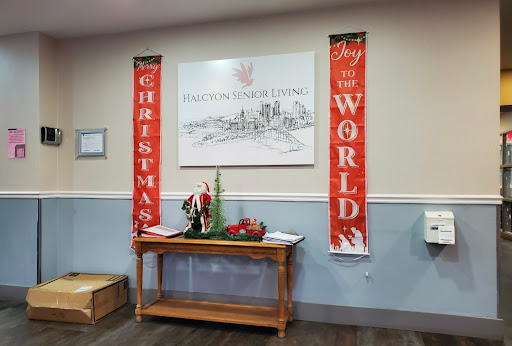 A festive display featuring Christmas banners in a welcoming interior setting.