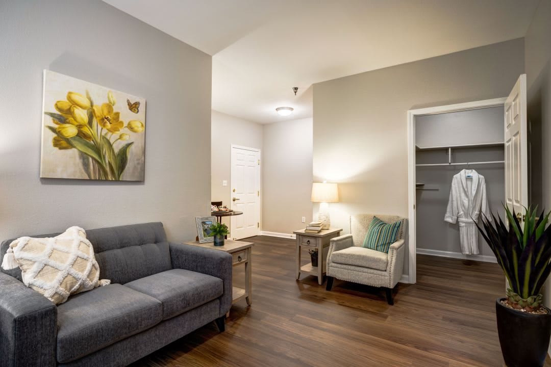 A cozy living room with modern furniture and warm lighting.