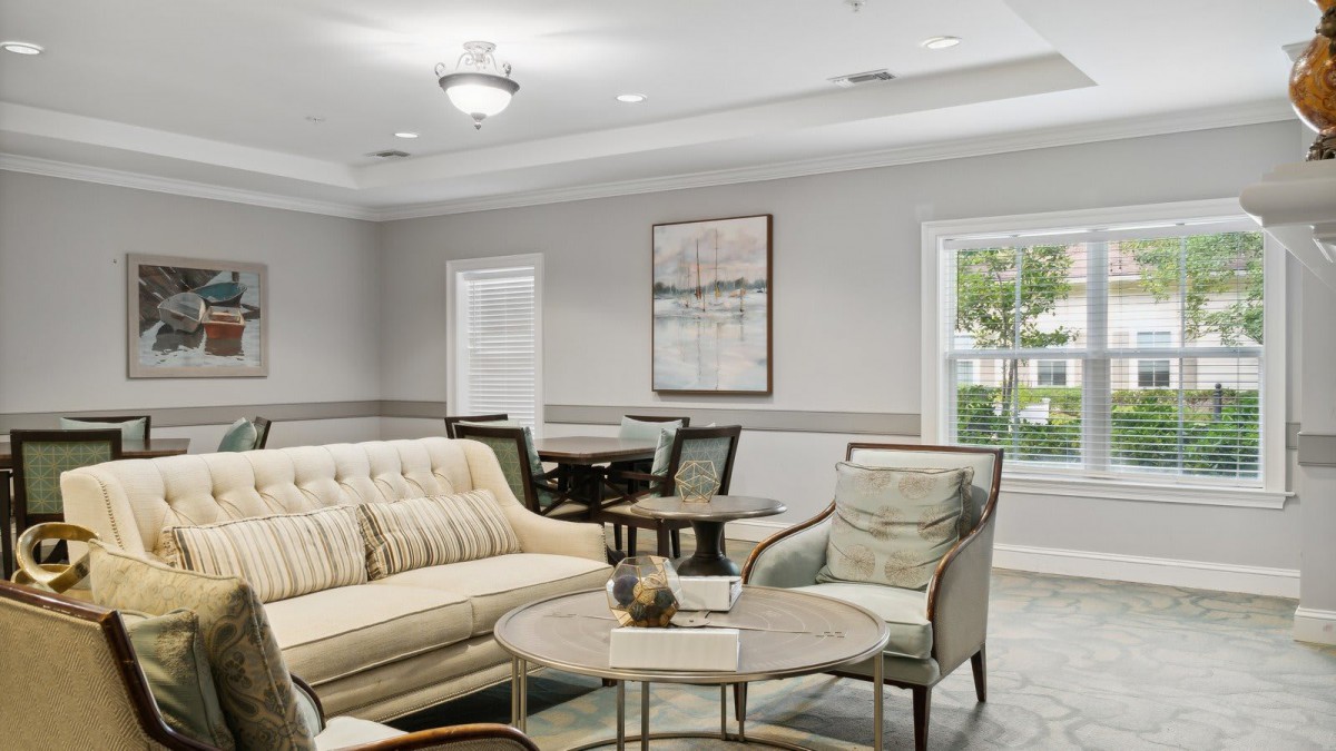 A modern living room with comfortable seating and stylish decor.