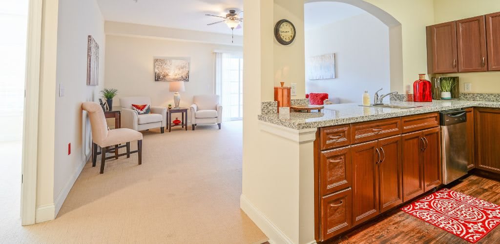 A bright and modern living room with elegant furniture and tasteful decor.